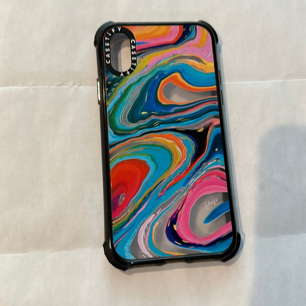 3 Xs iPhone cases 1 casetify and two other random brands.